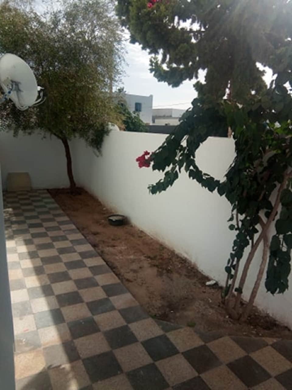 Appart s2 houmt souk corniche — salon et pièces de vie