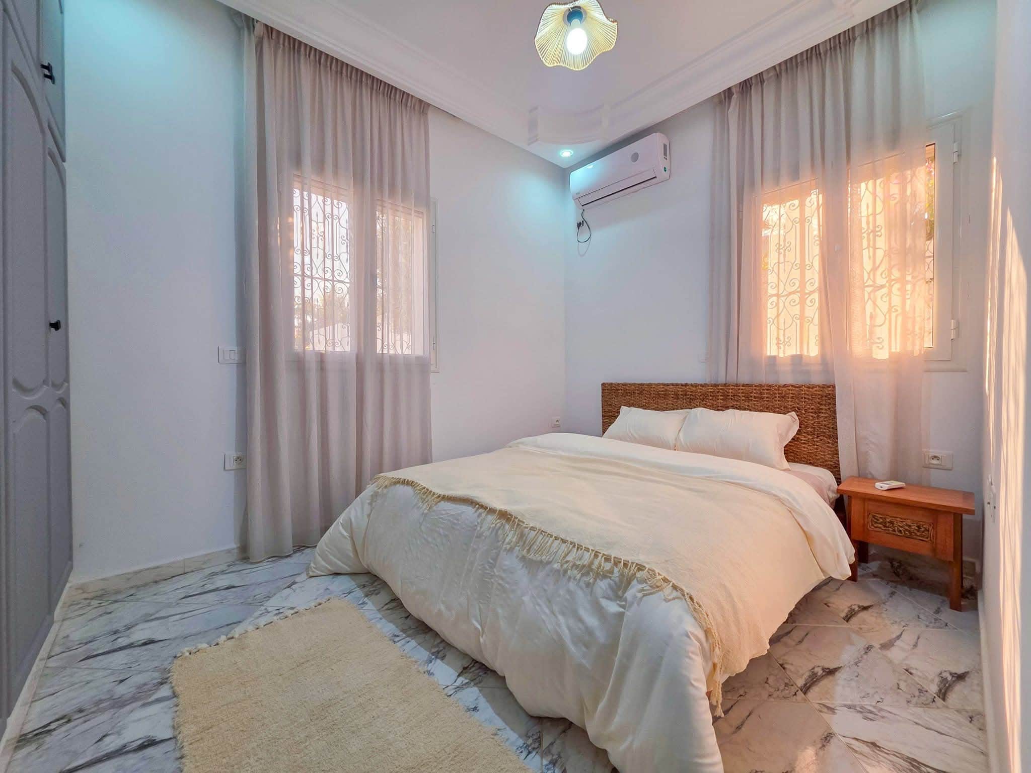 Villa s3 avec piscine meuble rotin — vue extérieure à Midoun, Djerba