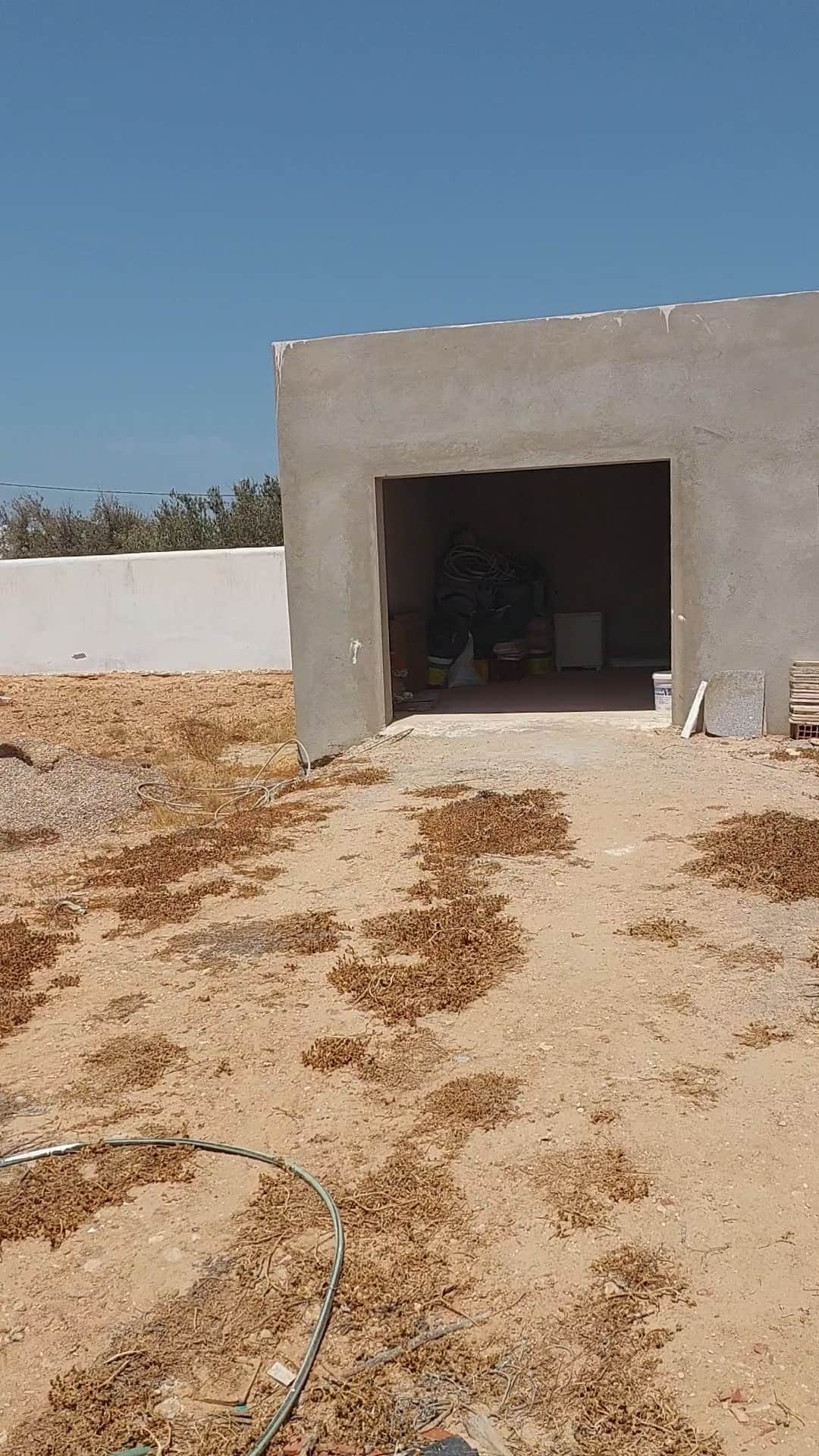 Terrain cloturé de 3900 m2 avec permit de batir — vue extérieure à Houmt-Souk, Djerba